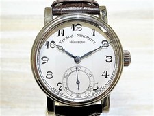 トーマスニンクリッツのカテドラル 自動巻き腕時計を買取致しました。銀座本店です。状態は通常使用感があるお品物です。