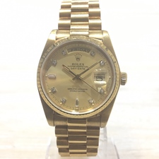 ロレックスのデイデイト Ref.18038 10Pダイヤ 750YG 自動巻き時計をブランド買取の銀座本店で買取致しました。状態は若干の使用感がある中古品です。