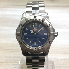 タグホイヤーのWK1213 2000シリーズ プロフェッショナル200ｍ デイト クオーツ腕時計を銀座本店で買取いたしました。状態は目立つ傷や汚れがあるお品物です。※不動品