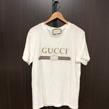 大阪心斎橋店にて、グッチのダメージ(クラッシュ)加工、オーバーサイズ・ロゴ半袖Tシャツ/半袖カットソー(白)を高価買取いたしました。状態は通常使用感のお品物です。