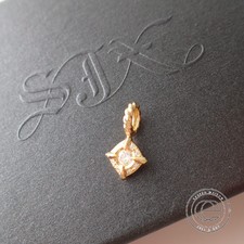 エスジェイエックスの5ZC0095 K18 0.16ct ダイヤモンド チャーム ペンダントトップを買取いたしました。状態は通常使用感があるお品物です。