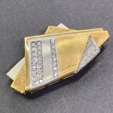 銀座本店で、石川暢子のK18×Pt900素材のダイヤモンド0.41ctのブローチを買取いたしました。状態は通常使用感があるお品物です。