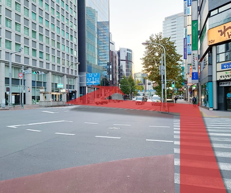 新橋駅銀座口を出て左手の新橋駅銀座口交差点を反対車線に渡って右に曲がって直進してください。