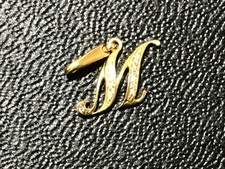 ノンブル(nombre)の通常使用感のあるアルファンプティのイニシャル「M」ペンダントトップを買取いたしました。新宿店です。状態は-