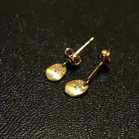 ハムの0.015　ダイヤピアスの買取実績です。