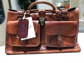 サンダストのタン　バーボン　トラベルバッグの買取実績です。