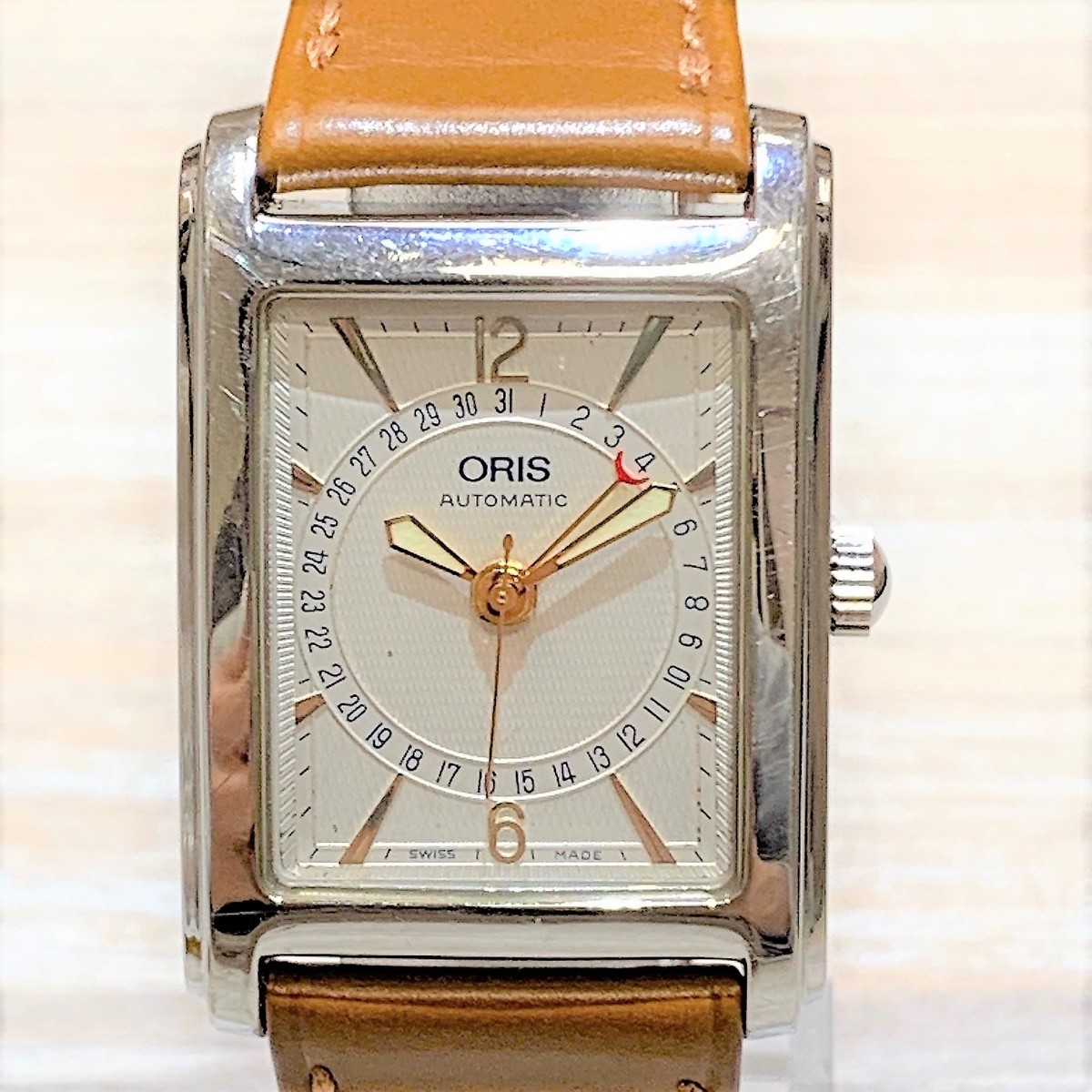 オリスのB7460　レクタンギュラボ　インターデイト　自動巻き　腕時計の買取実績です。