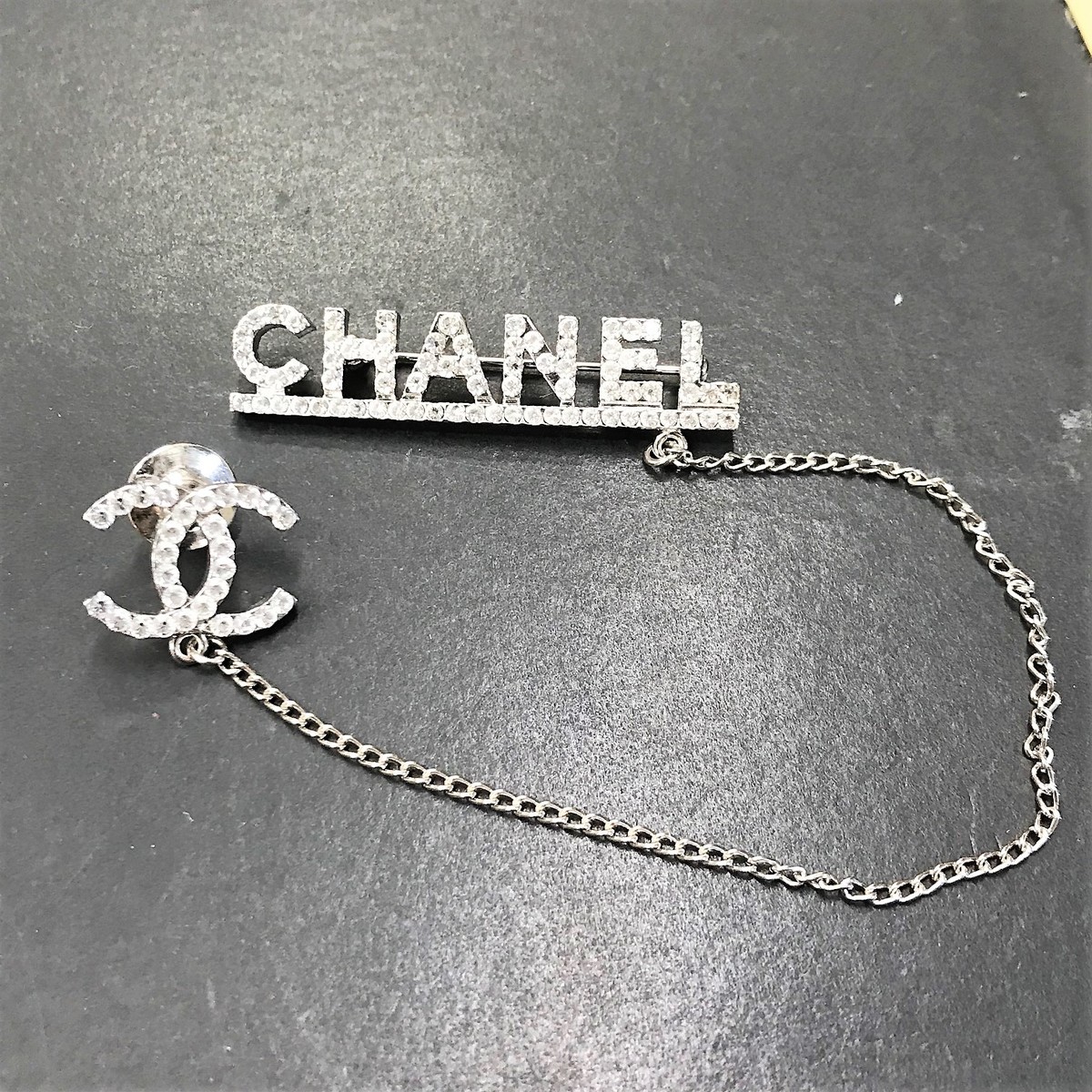 CHANEL ロゴブローチ | www.dreampropertiesvalencia.com