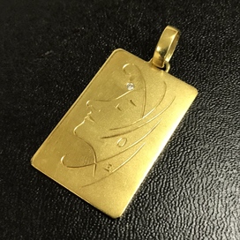 金のK18 ダイヤモンド付き プレート ペンダントトップの買取実績です。