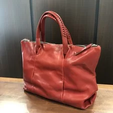 大阪心斎橋店にて、一度も使用していないコーネリアンタウラスの赤、STONE BOSTON(レザーボストンバッグ)を高価買取いたしました。状態は未使用品です。