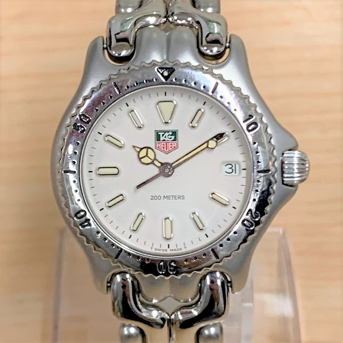 タグ・ホイヤーのS99.013M 白文字盤 デイト クオーツ 腕時計の買取実績です。