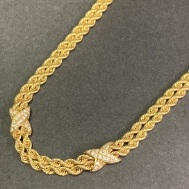 金のK18素材のダイヤモンドデザインのツイストチェーンネックレスの買取実績です。