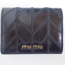ミュウミュウ 5MV204 VIT.SHINE PATCH　レザーパッチワーク　二つ折り財布(小銭入れあり)　NERO 買取実績です。