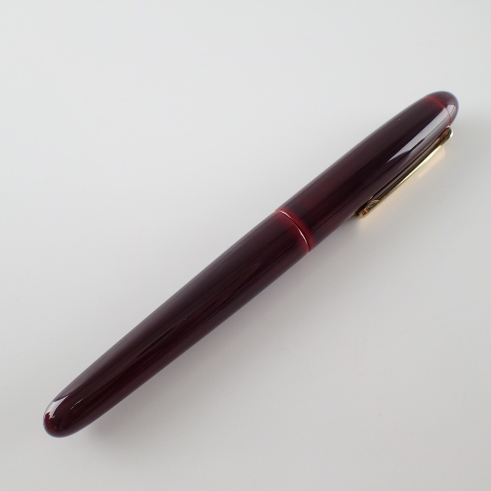 中屋万年筆のライターモデルポータブル赤溜 (ペン先:K14/大) 胴軸ネジ総エボナイト漆仕上げ万年筆の買取実績です。