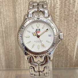 エコスタイル銀座本店で、タグホイヤーの品番がS90.813 S/elのセルシリーズprofessionalの200mで、デイト付き回転ベゼルのボーイズ腕時計を買取いたしました。