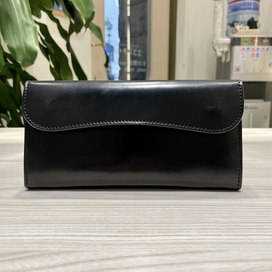 ワイルドスワンズのブラック シェルコードバン ウェイブ 長財布の買取実績です。
