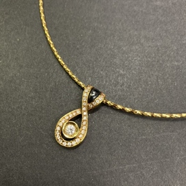 ダイヤモンドのk18 ダイヤモンド 0.15ct×0.35ct デザインネックレスの買取実績です。