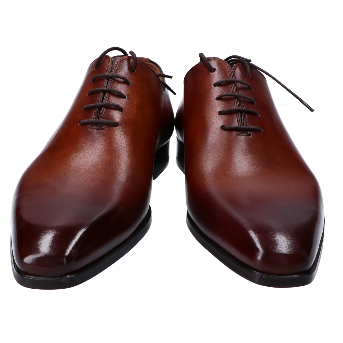 心斎橋でマグナーニを買取。コニャックカラーのレザーホールカット