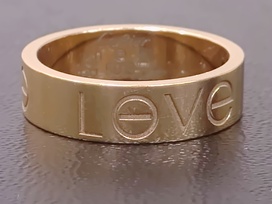 カルティエの750YG LOVEロゴ ラブリングの買取実績です。