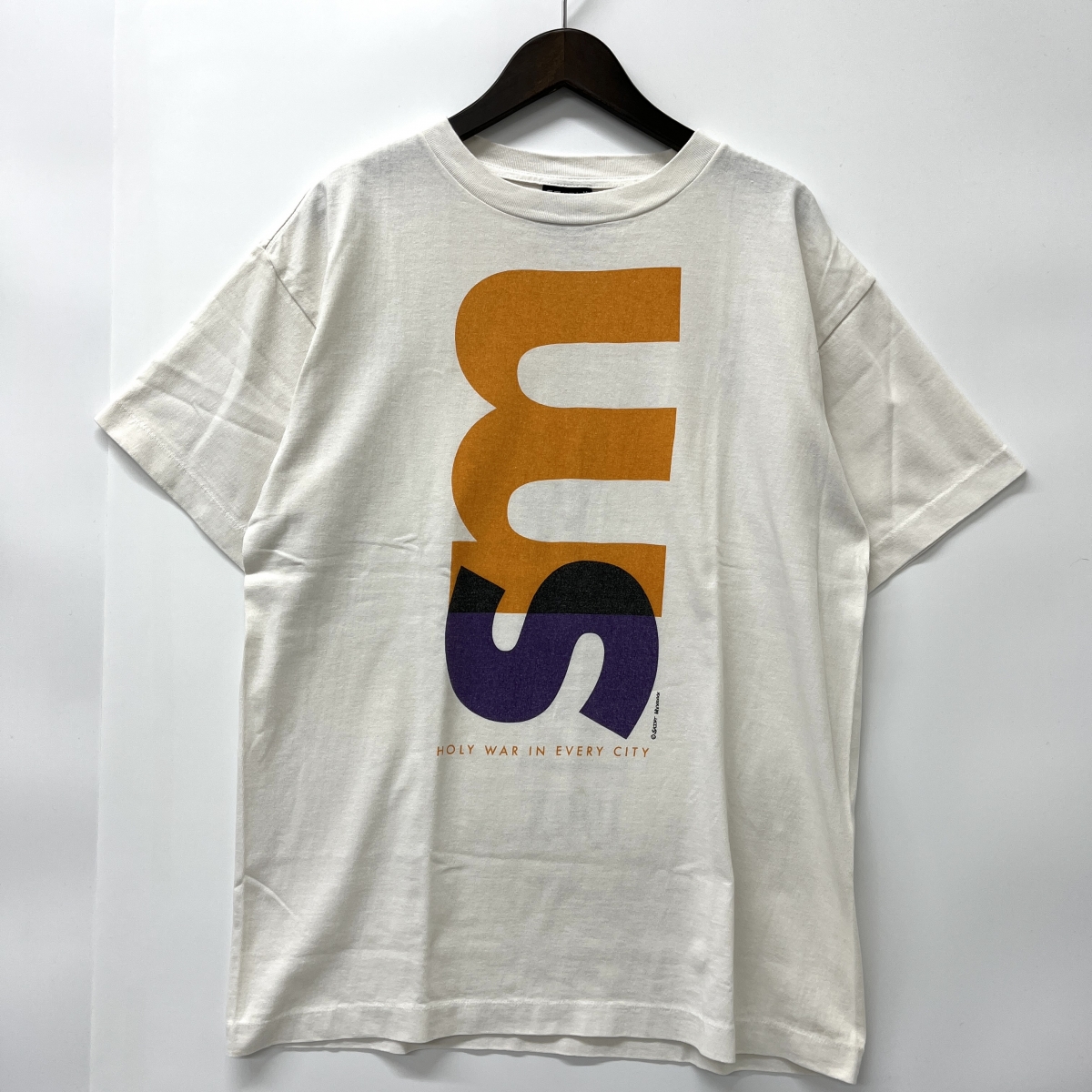 セントマイケルの21年製 ホワイト NEW ORDER コットン Tシャツ SM-A21-0000-009の買取実績です。