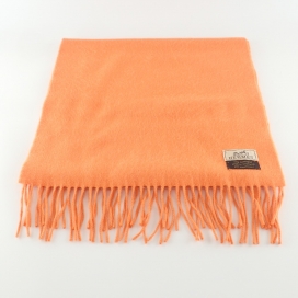 エルメスのオレンジ カシミヤ100 ブランドロゴ刺繍 フリンジ マフラーの買取実績です。