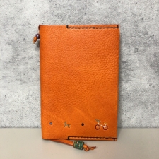 アンリークイール オレンジ オールレザー CARTABUE 自転車・犬刺繍入り ブックカバー 買取実績です。