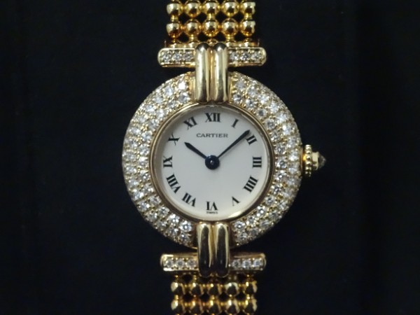カルティエのグリゼ　ダイヤベゼル　750　クオーツ時計の買取実績です。