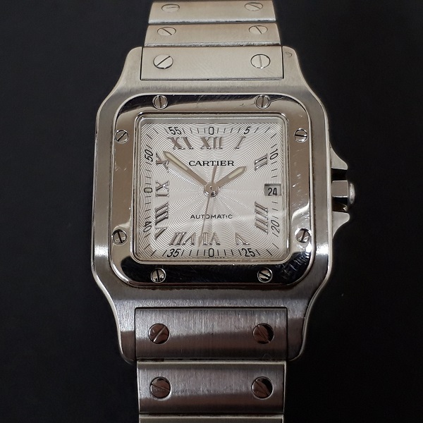 カルティエの2319 サントスガルベMM 自動巻き時計　※リューズに欠けの買取実績です。