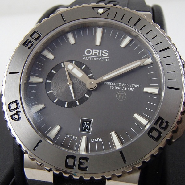 オリスのアクイスチタン スモセコ デイト ラバーベルト 自動巻時計の買取実績です。